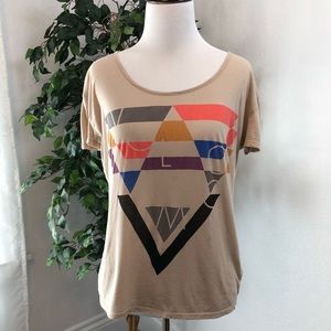 Tan Volcum Tee with colorful screen print.